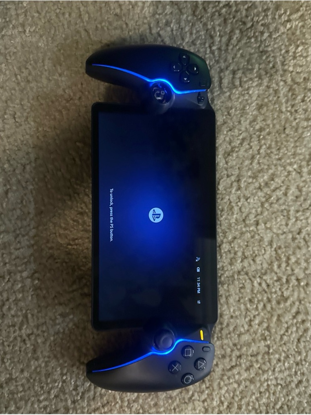 Sony Black Handheld Gaming Console with Blue LED Accents